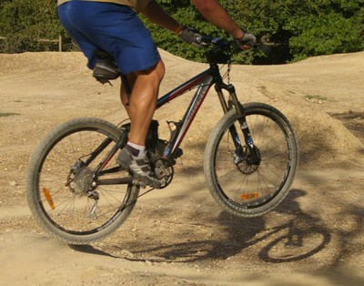 Carl jumping at the local BMX park